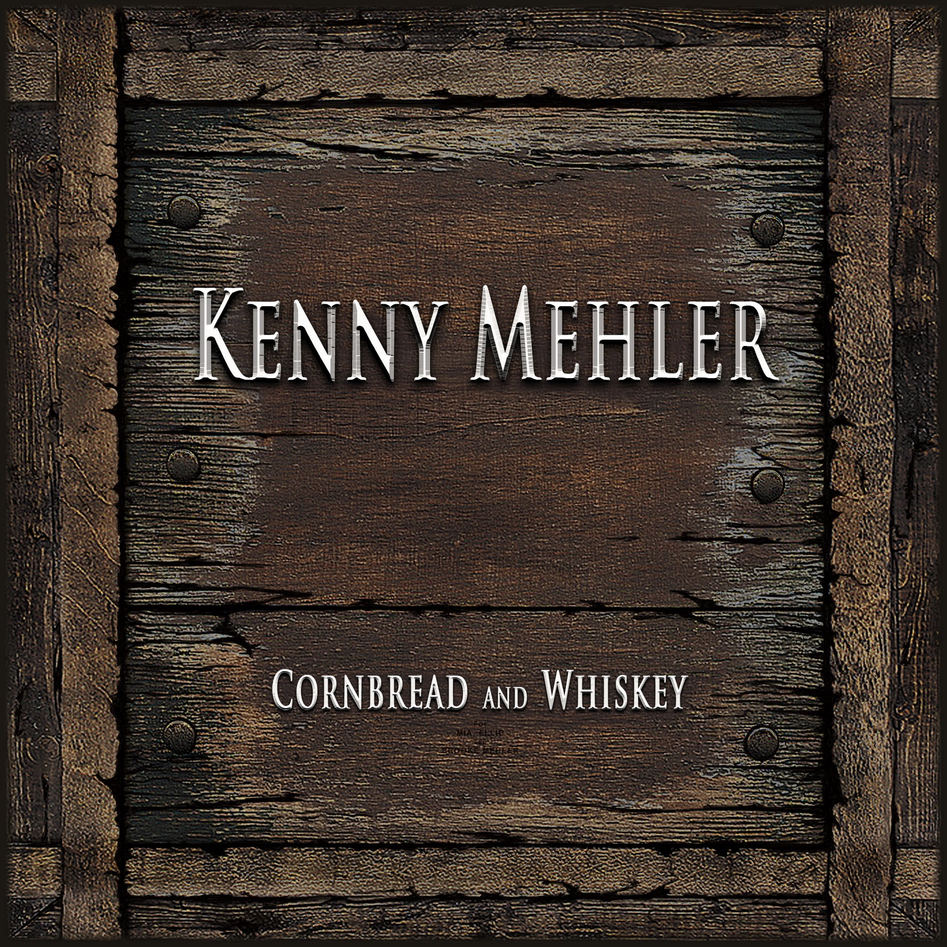 Wooden panel with 'Kenny Mehler Cornbread and Whiskey' text