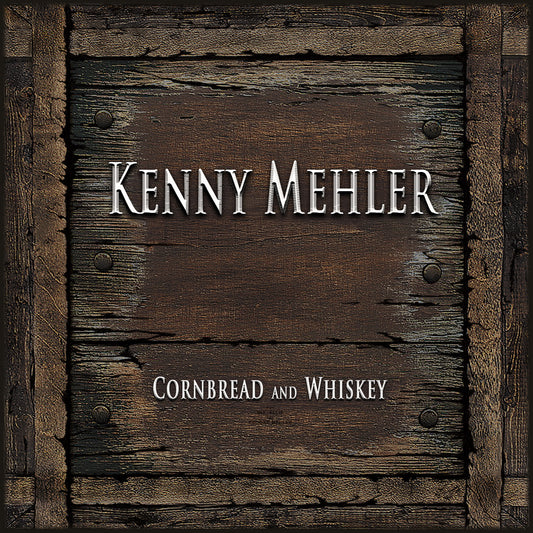 Wooden panel with 'Kenny Mehler Cornbread and Whiskey' text