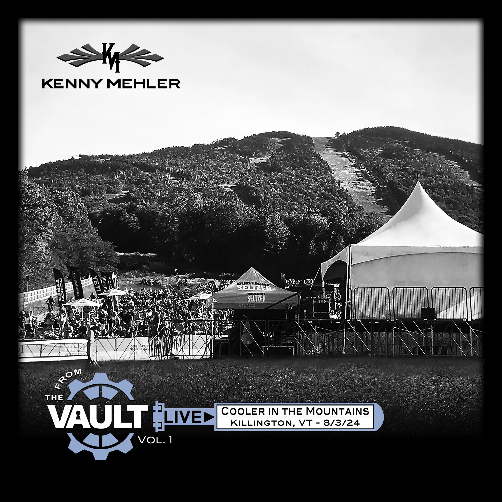 Black and white event photo with tents and people, featuring Kenny Mehler branding.