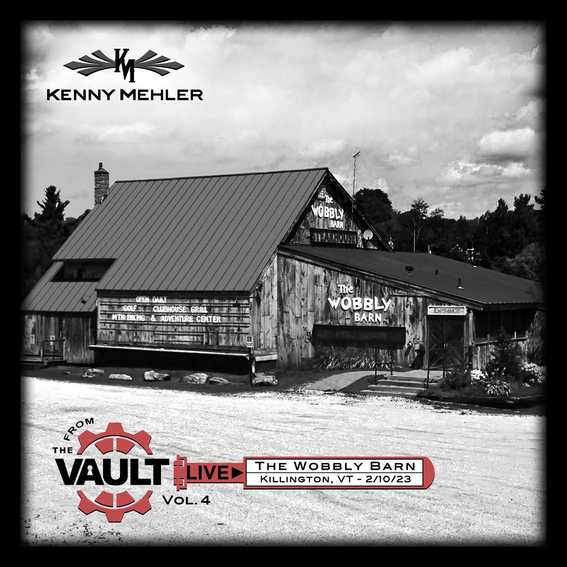 Black and white image of a barn with 'The Wobbly Barn' sign, featuring Kenny Mehler branding.